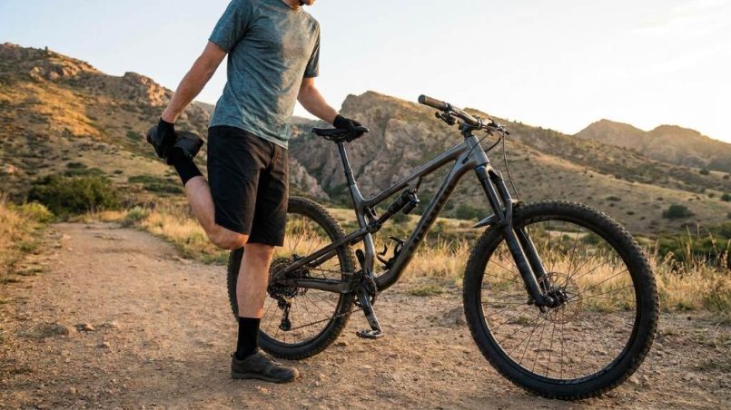 Mountain biker climbing a rugged Denver trail